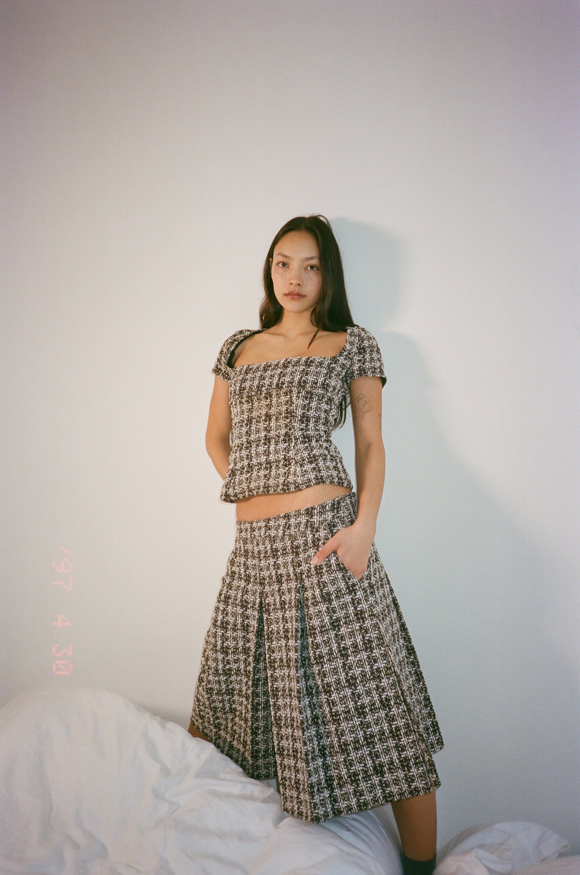 Full-lenght pleated skirt in burgundy checkered bouclé wool blend