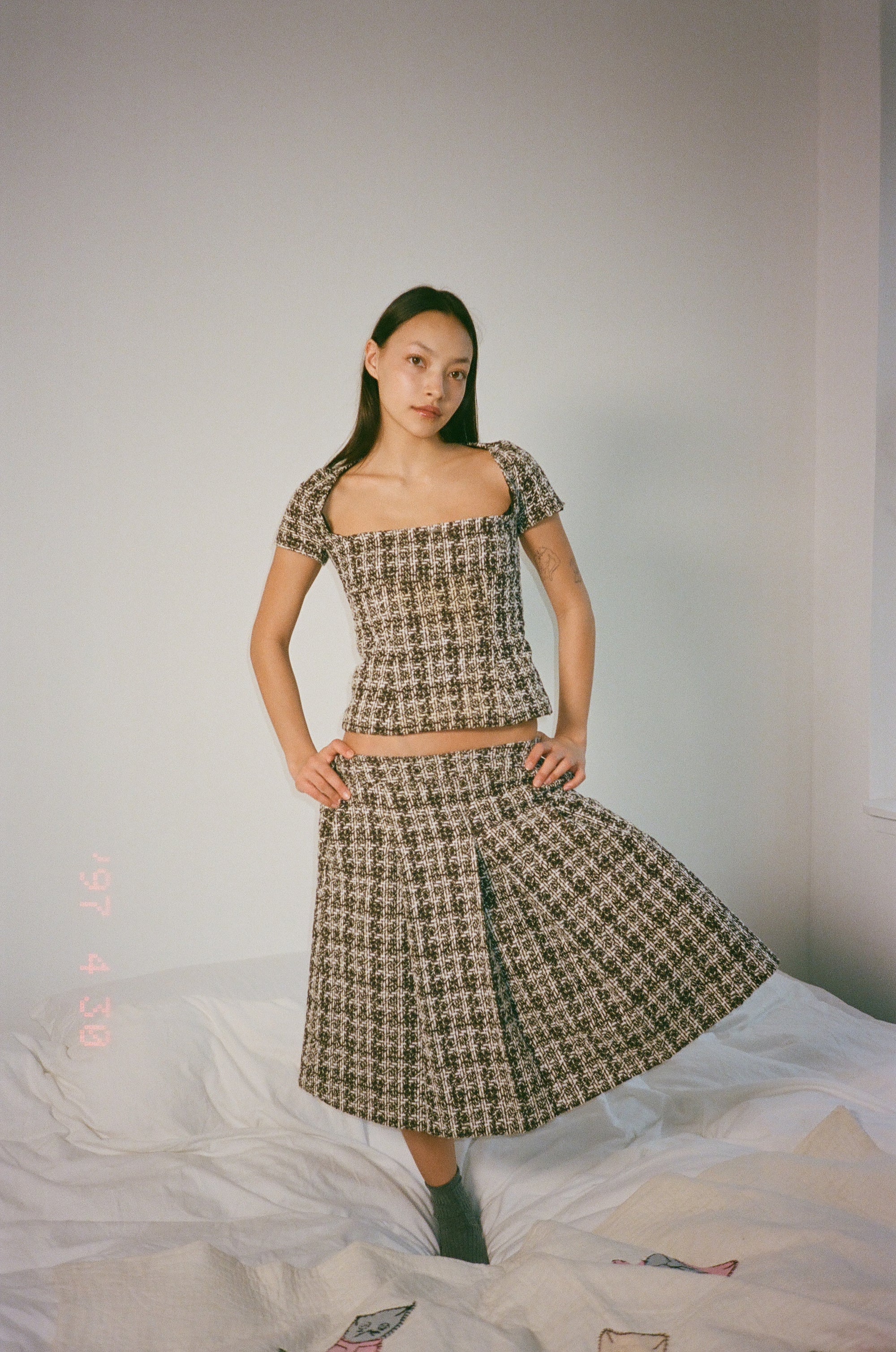 Full-lenght pleated skirt in burgundy checkered bouclé wool blend