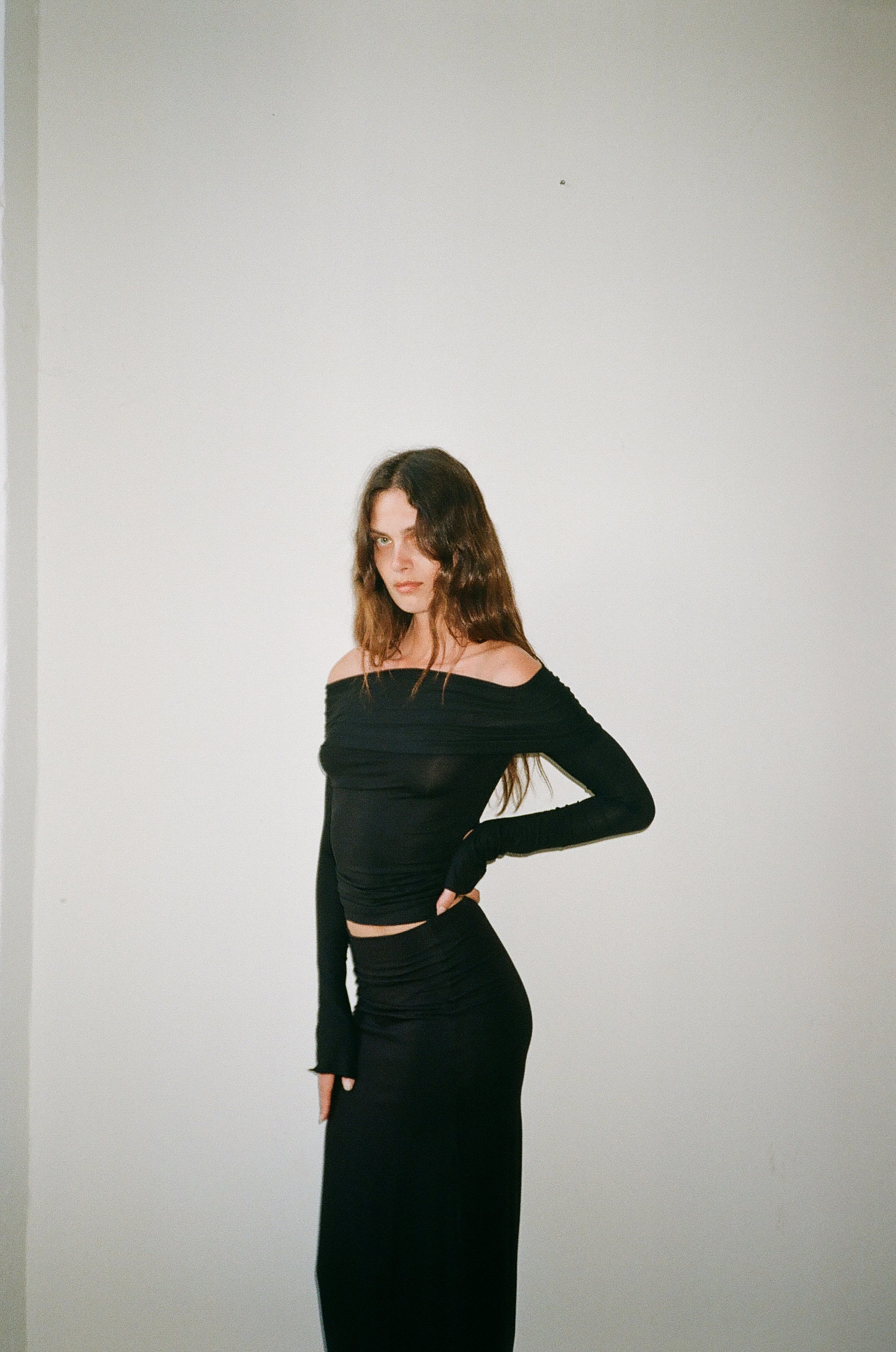 Long sleeved off shoulder top in viscose, black